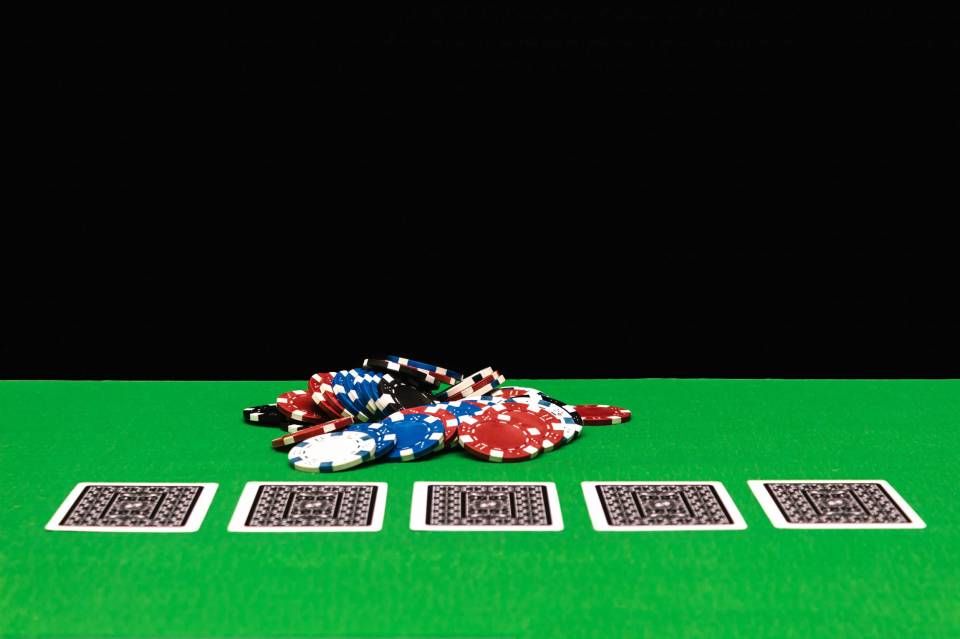 poker-chips-on-a-gaming-table-in-a-casino-2023-11-27-05-30-36-utc